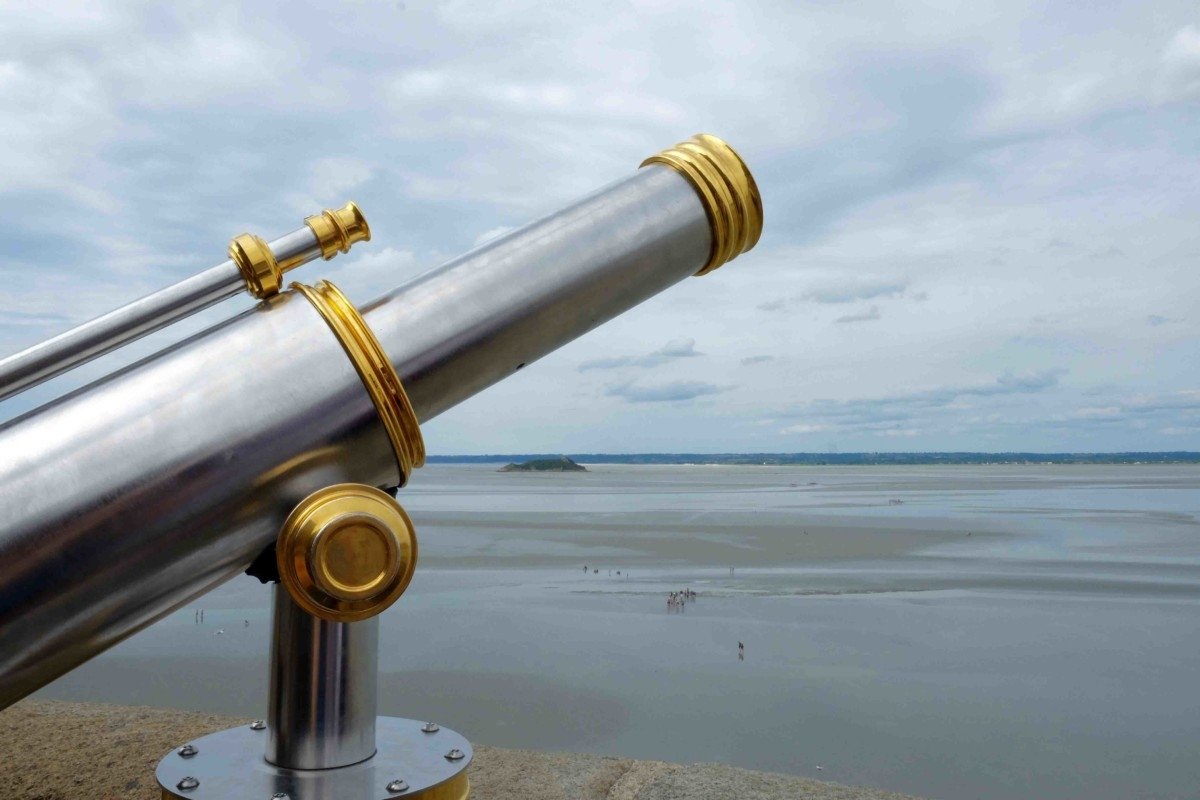 A telescope over looking the bay of Le Mont Saint-Michel