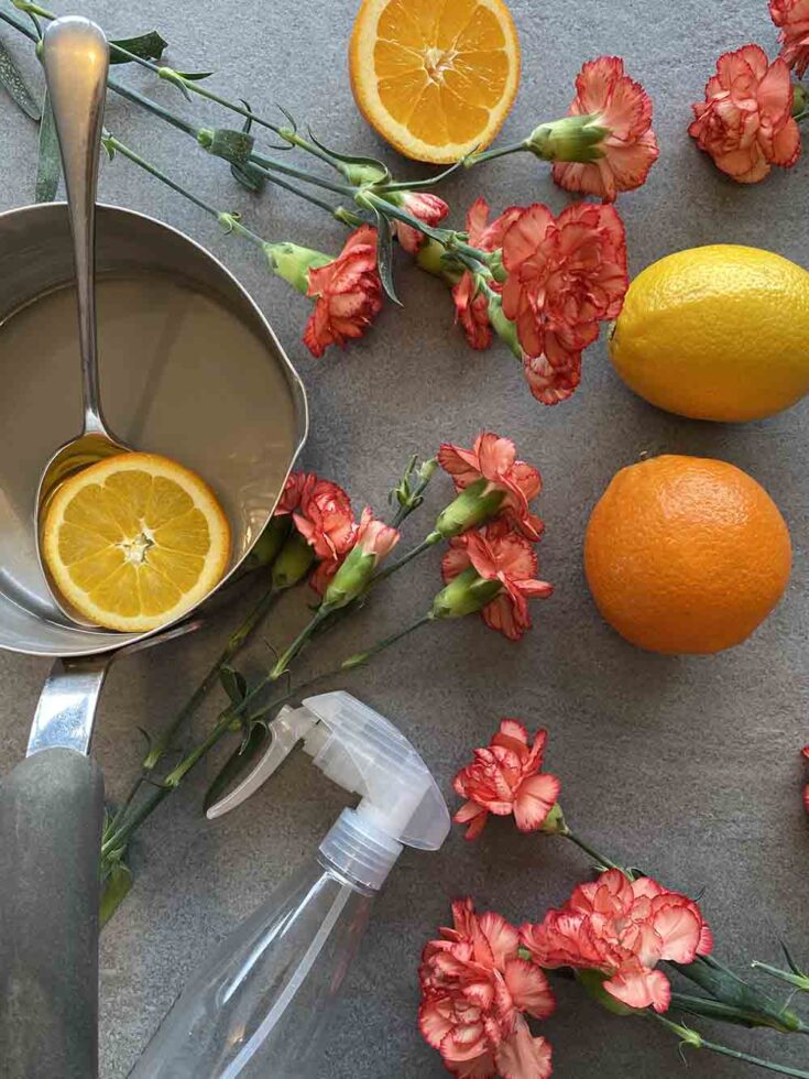 How to make hairspray at home using sugar water. Orange and lemon scented homemade hairspray for the curly girl method