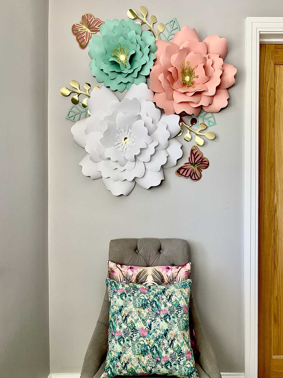 Huge paper flowers wall display, pink teal and gold giant paper flowers on wall