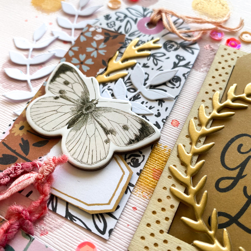 layered tag with chipboard and thread for interest By Donna Vallance