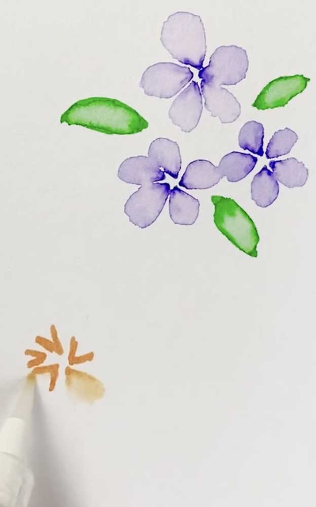 water colour brush pen tutorial pull out petal shapes with water on brush