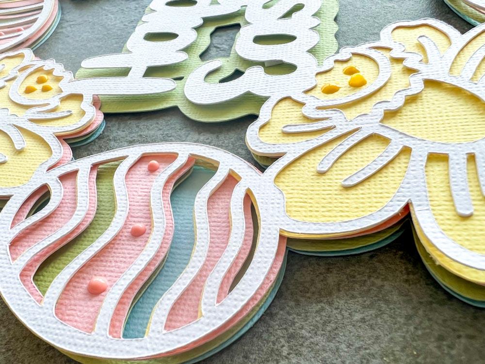 Close up of Easter egg wreath cut file svg in pastel card