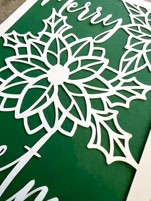 Free paper cut Poinsettia Christmas card SVGs happy christmas close up